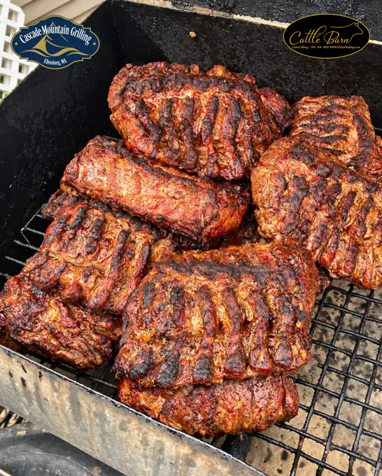 Meat cooking on a barbecue grill