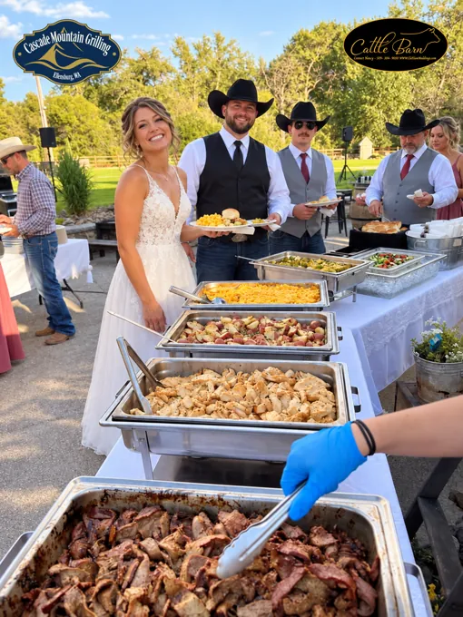 Cascade Mountain Grilling team serving a buffet